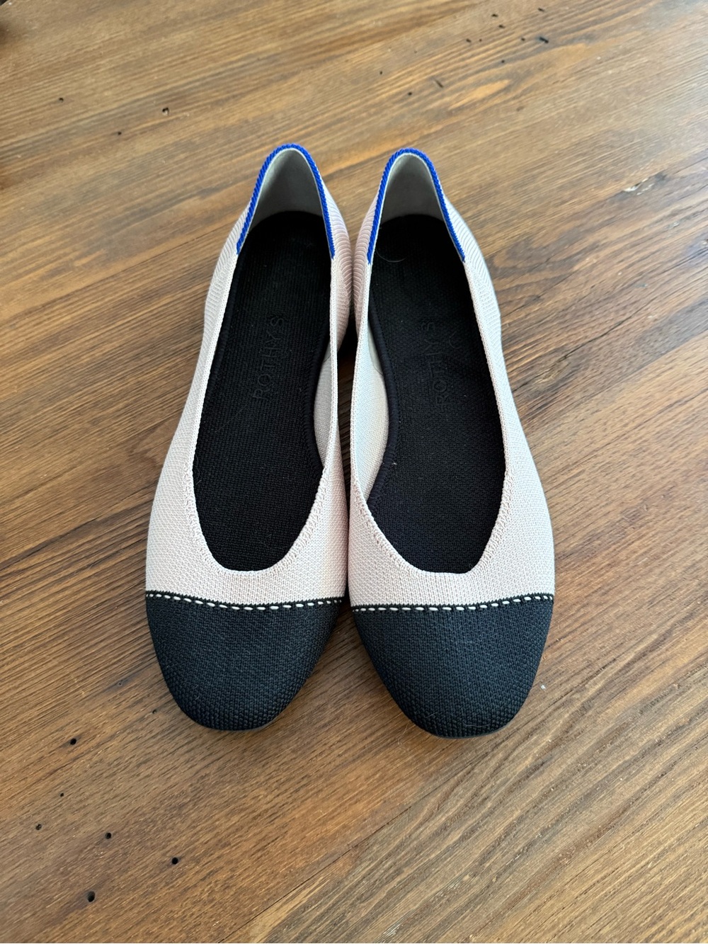 Rothy's Two-Tone Ballet Flats in Cream with Black Cap Toe